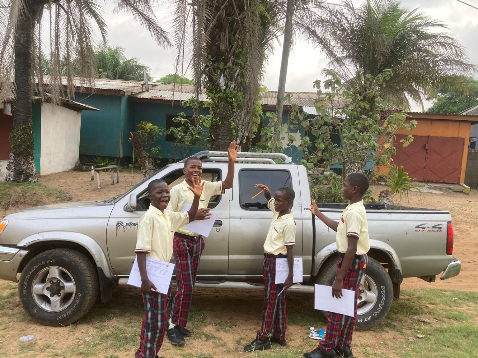 Students from Zoe Robinson Academy leaving for their hour-long journey to the national examination center in Liberia.